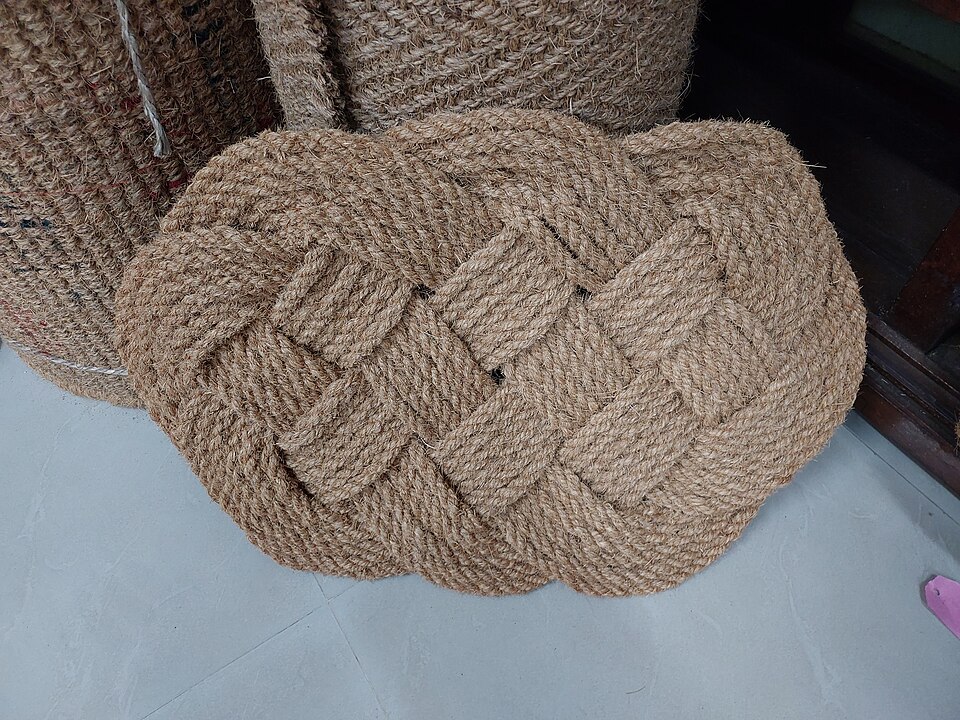 Hand-woven coir doormat