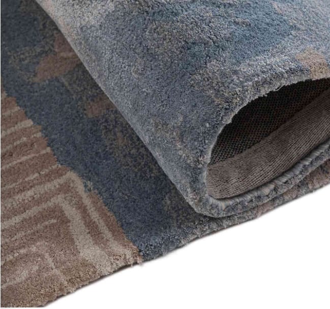 Hand-tufted rug in blue and taupe
